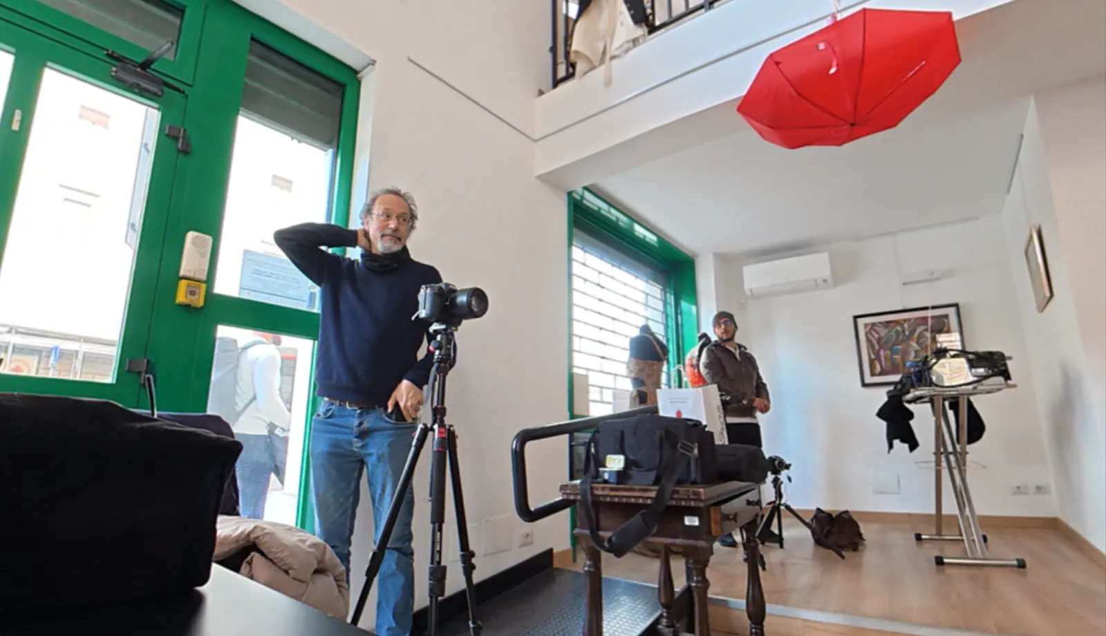 Documentary Gym filming setup with camera and production team